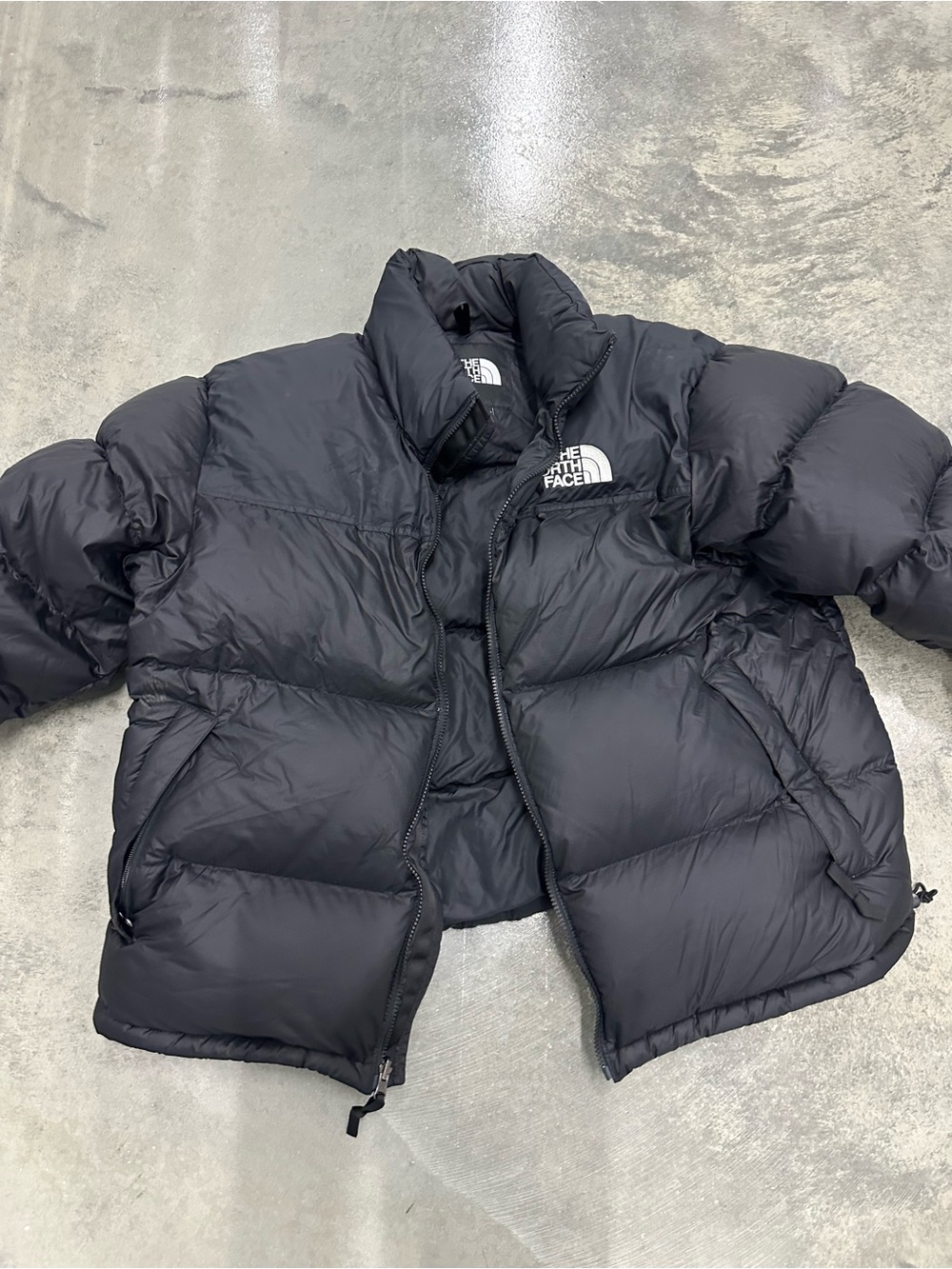 The North Face Black Puffer Jacket with White Logo